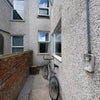 Photo 5: Window of spare room looking out to garden