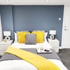 Photo 1: The bed is a storage bed so lots of additional space underneath
