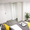 Photo 3: Modern, bright room
