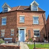 Photo 7: view of the house front