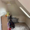 Photo 6: Space in the living area behind the dining table 