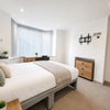 Photo 2: Room 1 off suite