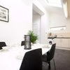 Photo 9: Dining area and open plan kitchen