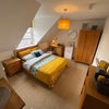 Photo 2: Second floor rear room - gorgeous solid oak furniture ottoman bed
