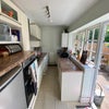 Photo 6: The kitchen