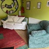 Photo 7: Shared lounge with TV, lots of books and a piano!