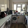 Photo 4: Kitchen with washer, dryer, fridge etc