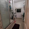 Photo 4: big bathroom with washing machine and dryer