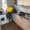 Photo 8: Utility toom with washing machine and downstairs toilet