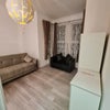 Photo 4: LOUNGE/BEDROOM