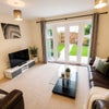 Photo 5: GF -  Communal Lounge area