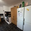 Photo 3: Kitchen with 2 fridge freezers, electric oven / gas hob, dish washer, microwave