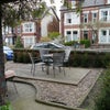 Photo 10: Garden with bistro table and chairs