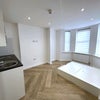 Photo 9: Room 1 - Bedroom/living area