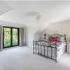 Photo 2: Spacious room looking over back garden