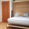 Photo 6: 🛏️ Comfortable Pull-Down Bed