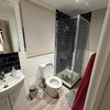 Photo 8: Blue tiled bathroom