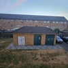 Photo 4: Communal area - bins/washing/parking