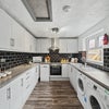 Photo 2: Fully equipped kitchen