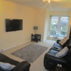 Photo 1: Living room (TV not available)