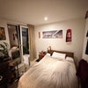 Photo 2: Spacious double bed room with skyline views