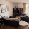 Photo 7: Spacious living room with TV, PS5, etc