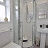 Photo 4: Shared bathroom (cleaned weekly by the landlords complimentary cleaner)