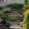 Photo 5: Garden (Decking has Bean Bags | Patio has Table)