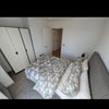 Photo 4: Smaller Room (Stock Photo) - we have one of the wardrobes in the corridor to fit a desk in