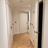 Photo 9: Corridor to Small Bedroom, Laundry Room on the right, Main Bathroom on the left,main Bedroom on left