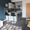 Photo 3: The shared kitchen / living room