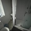 Photo 7: One of the toilets and showers 