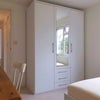 Photo 5: Bathroom to the right in corridor