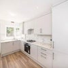 Photo 2: Kitchen with a dishwasher (!) and all new appliances