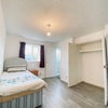 Photo 2: Bed and double wardrobe