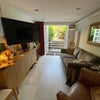 Photo 5: Shared stting space with TV, leading to rear garden
