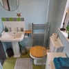 Photo 3: Bathroom with a walk-in shower, toilet, sink, and heated towel rail.