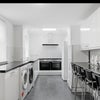 Photo 7: Kitchen + Living Area