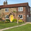 Photo 2: Front of cottage