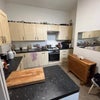Photo 5: Fully equipped with an oven, gas stove, microwave, kettle, toaster, coffee machine