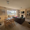 Photo 1: Shared living roon