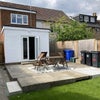 Photo 15: Patio space with outdoor furniture sets