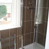 Photo 4: Upstairs shower room.