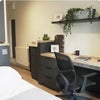 Photo 2: Studio bedroom and workspace — provided image