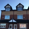 Photo 8: Front of house 