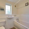 Photo 3: Upstairs bathroom with bath and shower head (shown in next picture) 