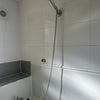 Photo 5: Upstairs bathrooms shower head.
