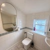 Photo 4: Shared bathroom (toilet & sink)