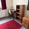 Photo 2: large bedroom with two windows