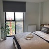 Photo 9: bedroom with built in storage 